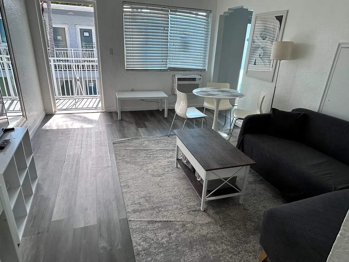 Building Photo - 7445 Harding Ave #211