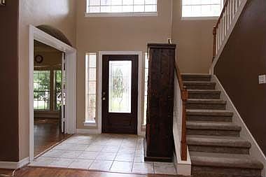 Just off the entry is the dinning room/ study and the open stairway.