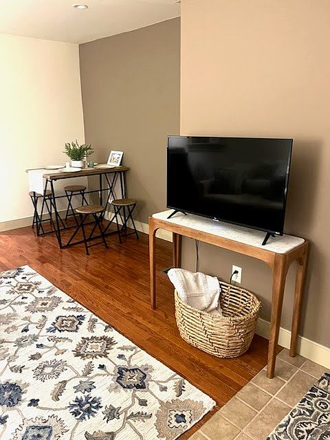 Living room with dining table near kitchen
