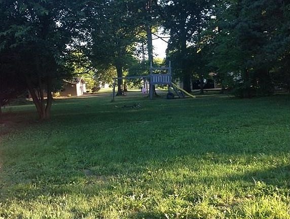 Back yard...swing set is staying!