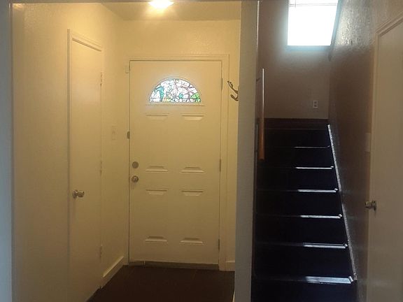 View of front door and stairs
