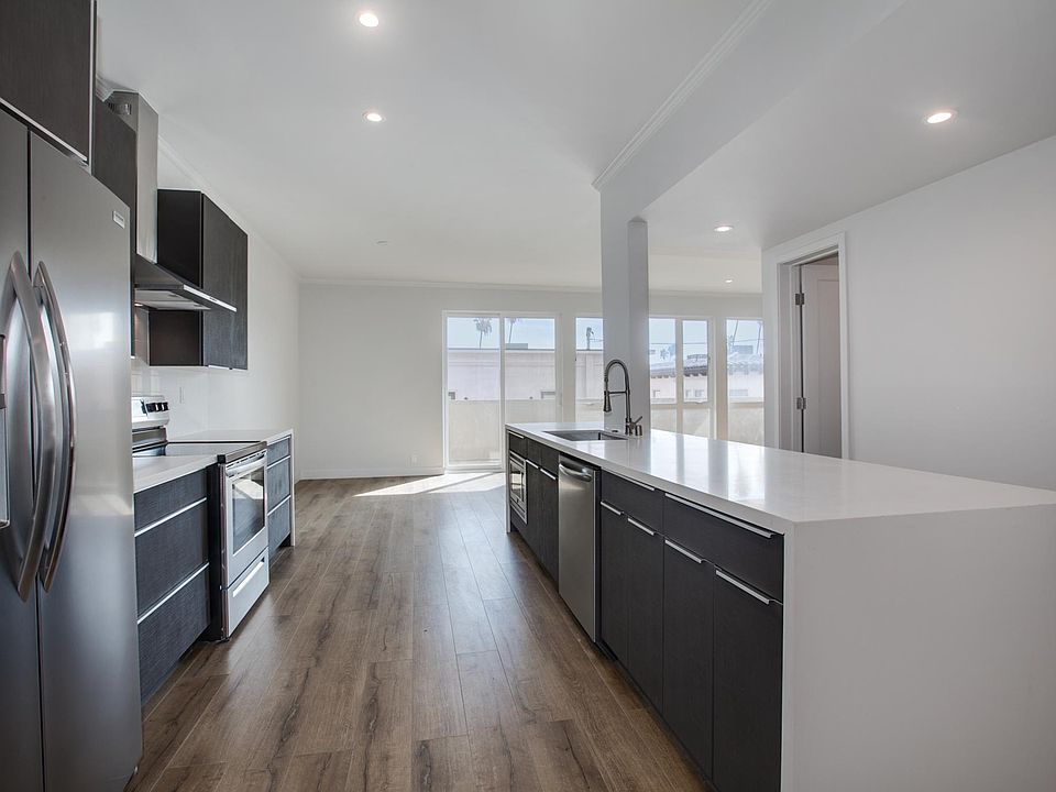 Entrance to the unit brings you in to the open kitchen
