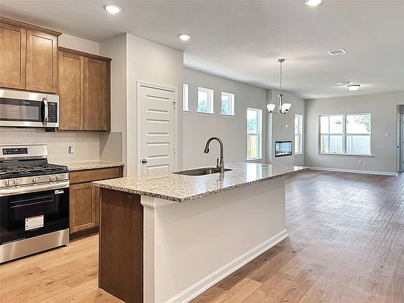 The Oakshire II- Kitchen into Family Room.