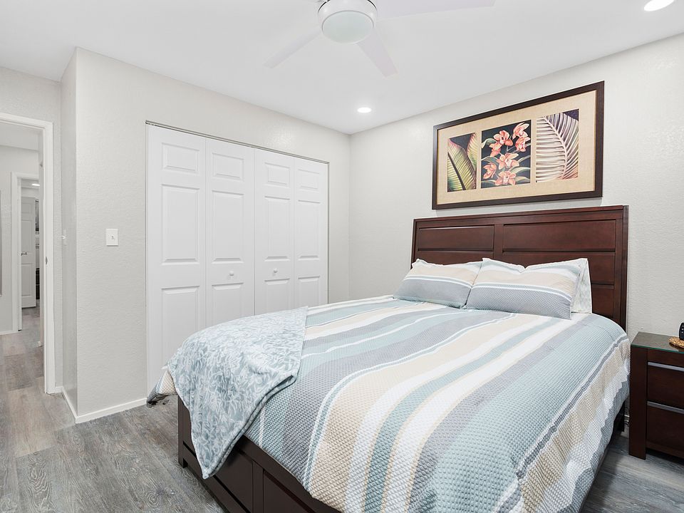 Main bedroom with queen bed and large closet