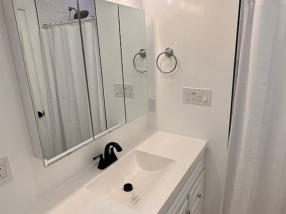Bathroom sink and light fixtures-newly remodeled