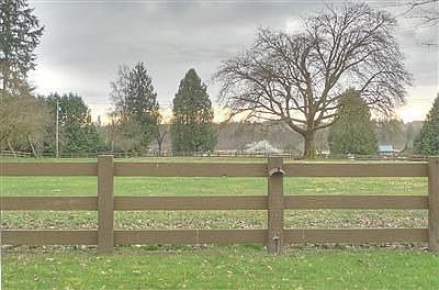 Looking west across the pasture, through apple trees, makes a breathtaking sunset scene from every w
