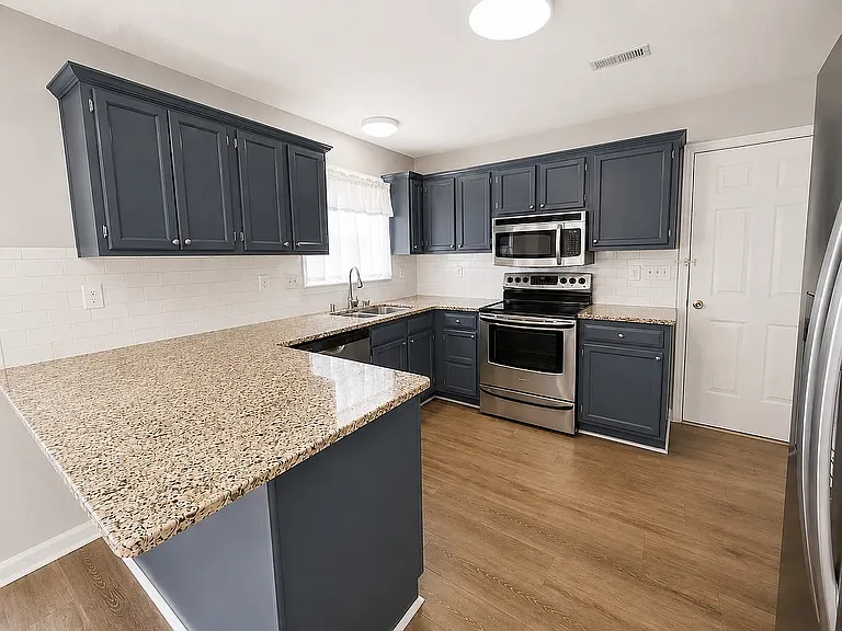 11000 Atrium Way — Photo 3