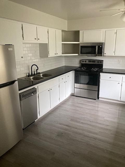 NEW IMPROVED KITCHEN WITH BUILTIN DISHWASHER AND MICROWAVE WITH QUARTZ COUNTER