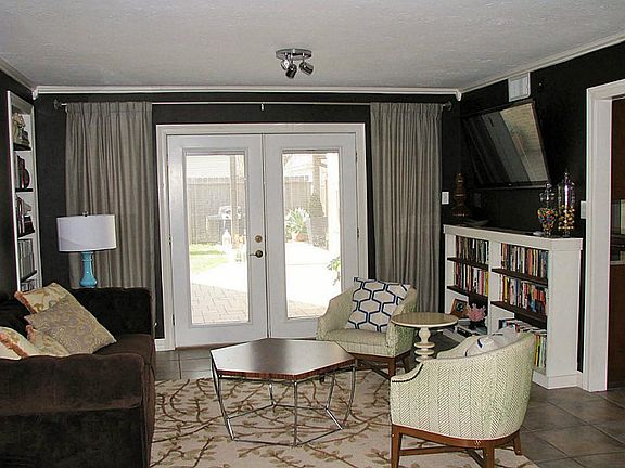 Enjoy the cozy den for unwinding at the end of the day.
