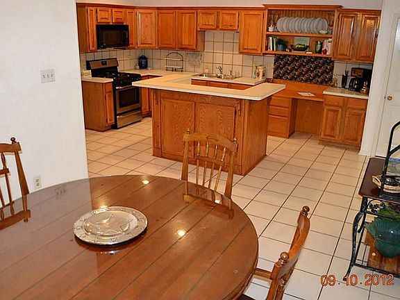 The kitchen overlooks the breakfast room.