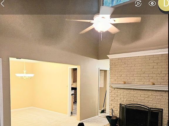 fireplace looking left diningroom with another entrance to the kitchen. Chloe, my service dog is not included. she likes to be in pictures