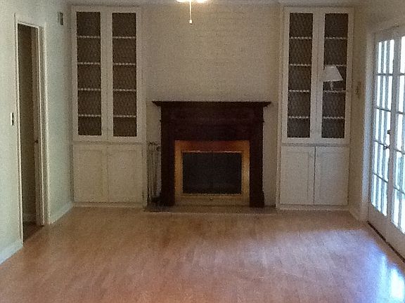 Den with gas burning fire pl