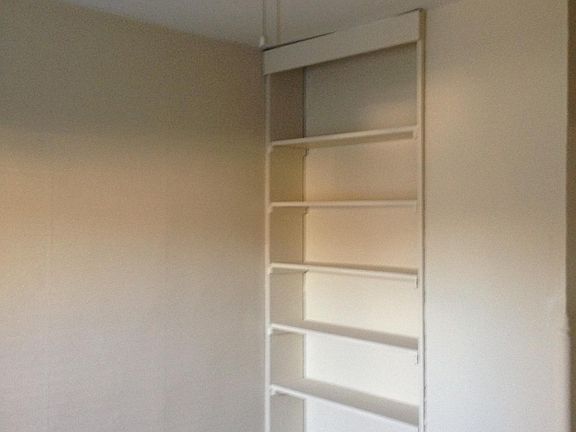 bedroom 1 built in shelves