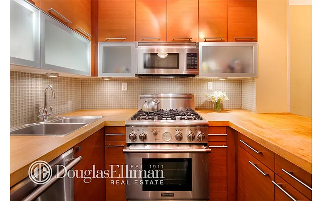 Sold by Douglas Elliman | media 11