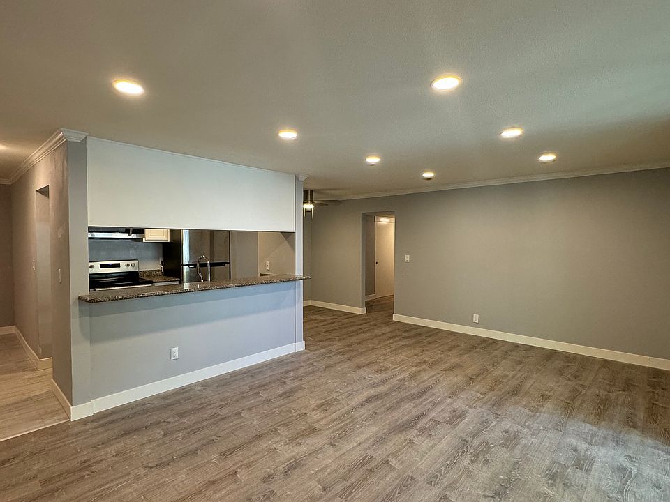 Large common area for entertaining talking out to a lovely patio