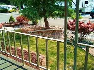 Nicely landscaped lot - covered porch