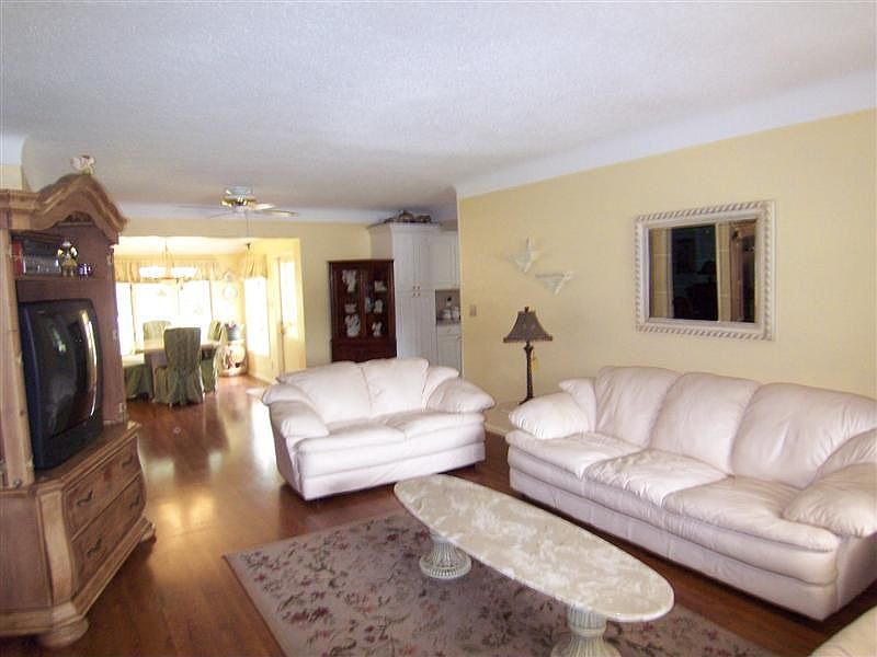 Beautifully Updated with Cherry Laminate Floors!