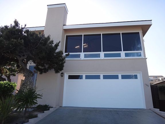 Front view of the home at 445 Coast Blvd.