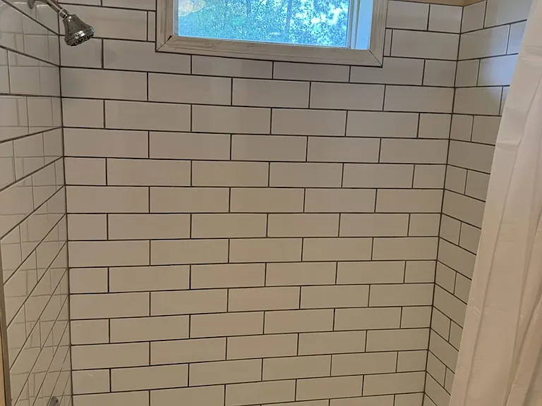 New tub and new tile shower enclosure