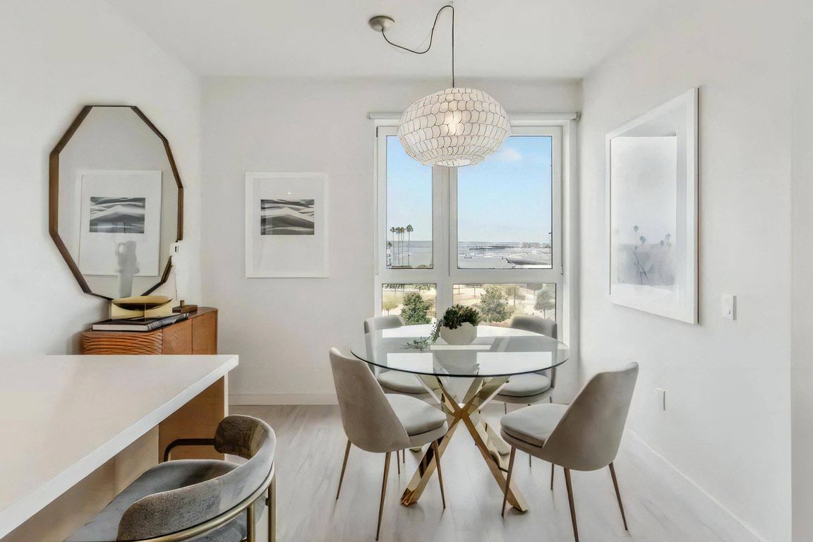 A dining nook that seats four, set right off the kitchen counter.