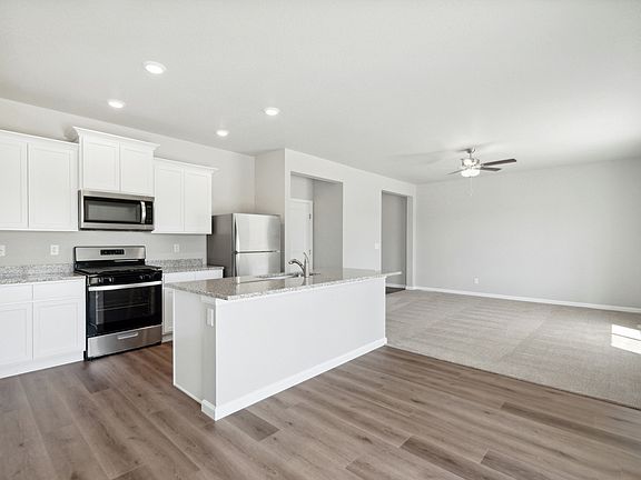 The kitchen of the Platte has sprawling granite countertops.