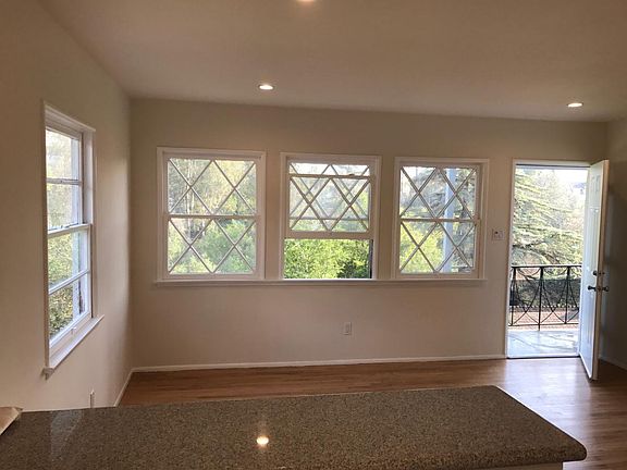 New hardwood floors in the living room with dimmable LED rec