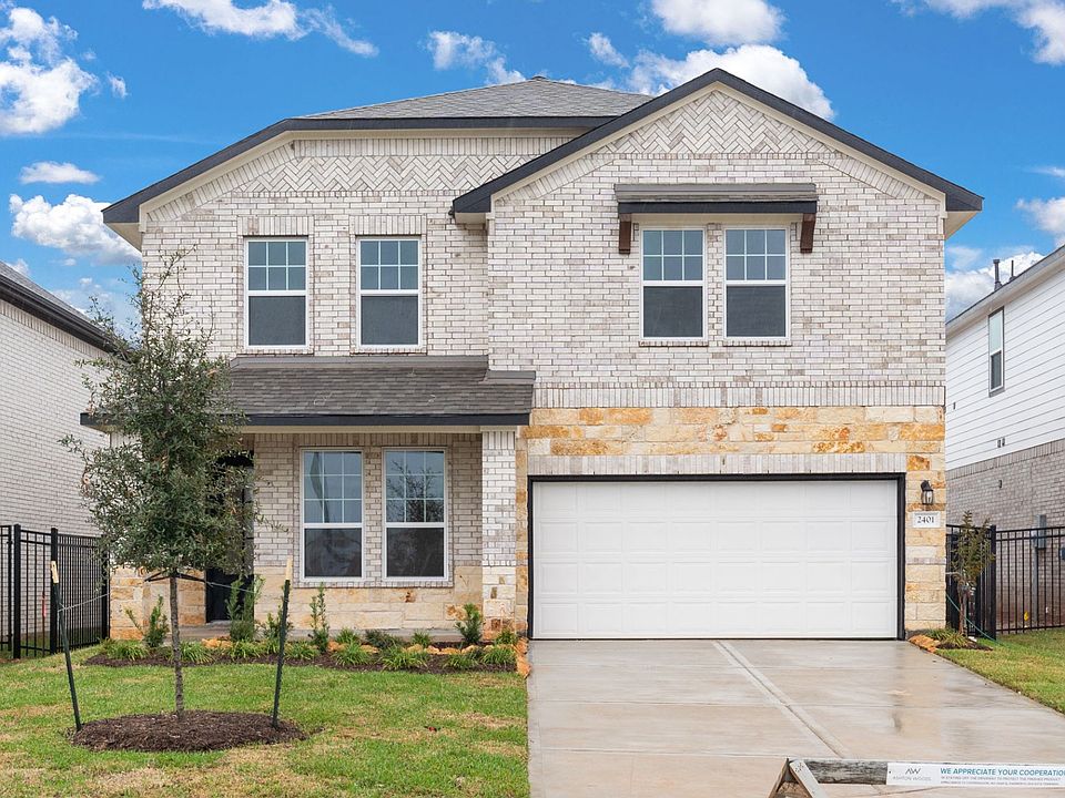 Welcome home to 2401 Coco Green Court located in the master planned community of Sunterra and zoned