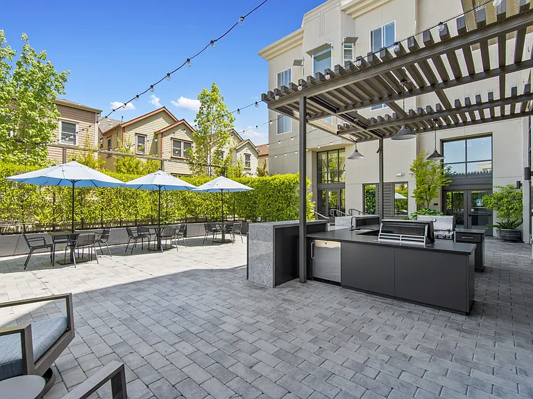 Outdoor Patio Grill and Tables at Aventine Apartments in Hercules, CA 94547