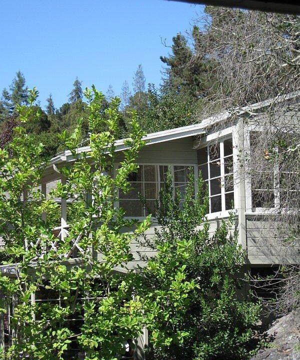 Private woodsy setting with treetop views.