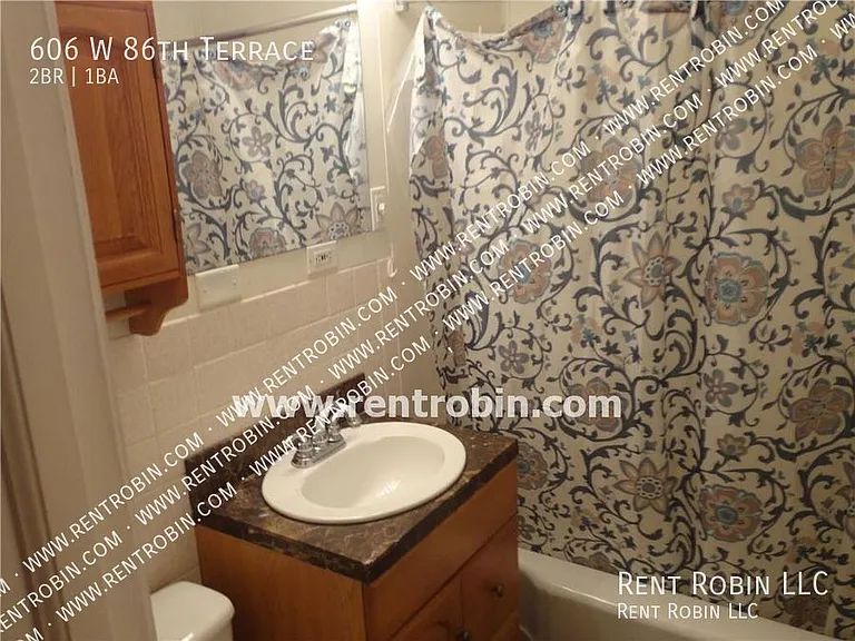 606 W 86th Ter — Photo 5