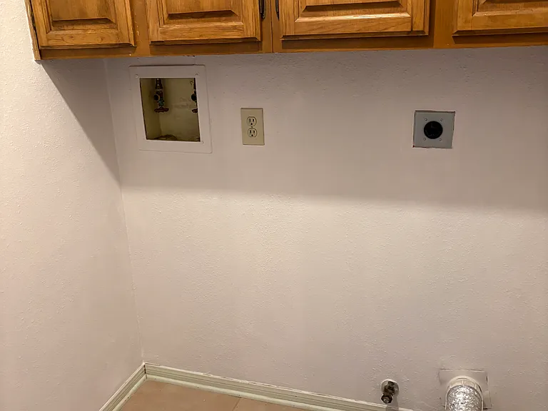 Laundry room off of kitchen