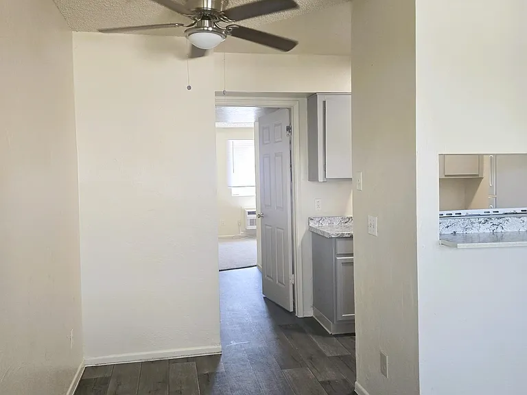 Dining area is perfect for a small table and a ceiling fan for added comfort