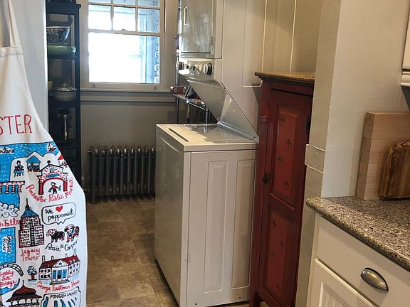 In unit laundry in pantry off of kitchen