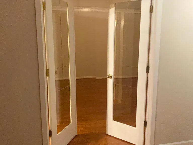 Glassed bedroom entry evening