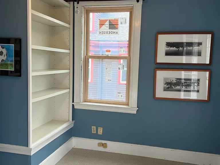 Built-in bookcase in the study with balcony