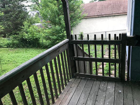 Fenced in back yard and deck