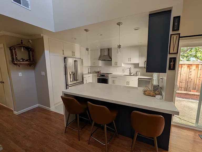 Kitchen with quartz countertop and custom cabinetry