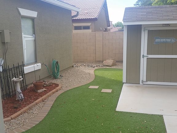 Artificial grass in backyard