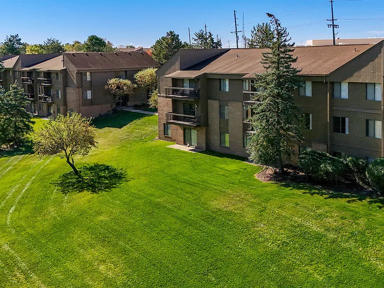 Expansive Green Space Apartment Building Exterior at Franklin River Apartments, Southfield, MI