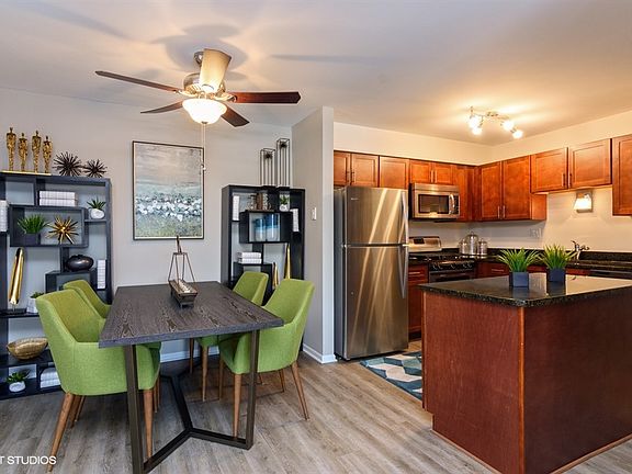 Open dining nook with ceiling fan at Brook Run in Arlington Heights, IL