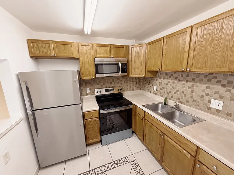 600 Village Green Ct #203 — Photo 12