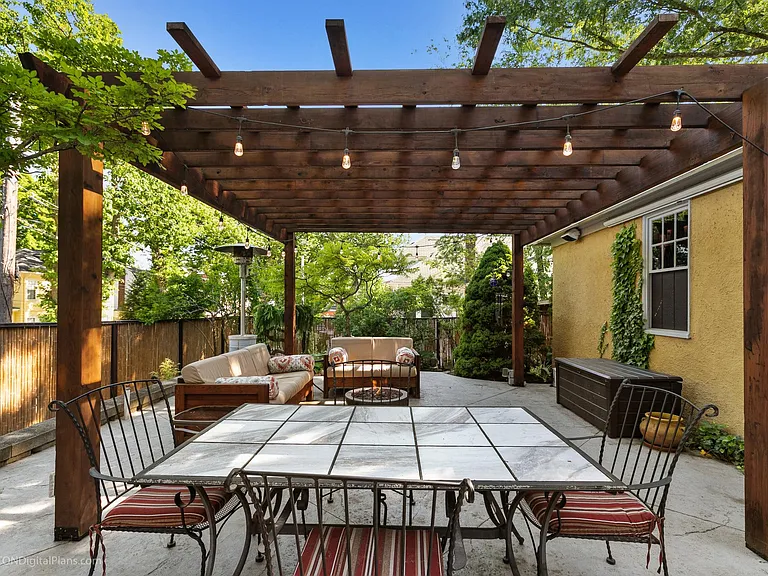 Outdoor dining and strung lights for a calming night in