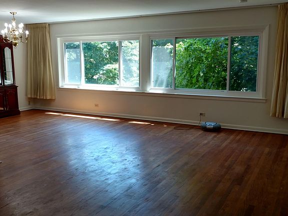 The L-shaped living room, dining room - looking southeast.