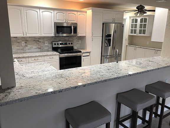 Wrap around bar seats 7