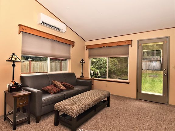 Door leads out to large patio for entertaining and enjoying the fully fenced yard.