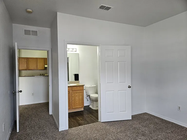 Private bathroom featuring modern fixtures and a clean, comfortable design for your convenience and privacy.