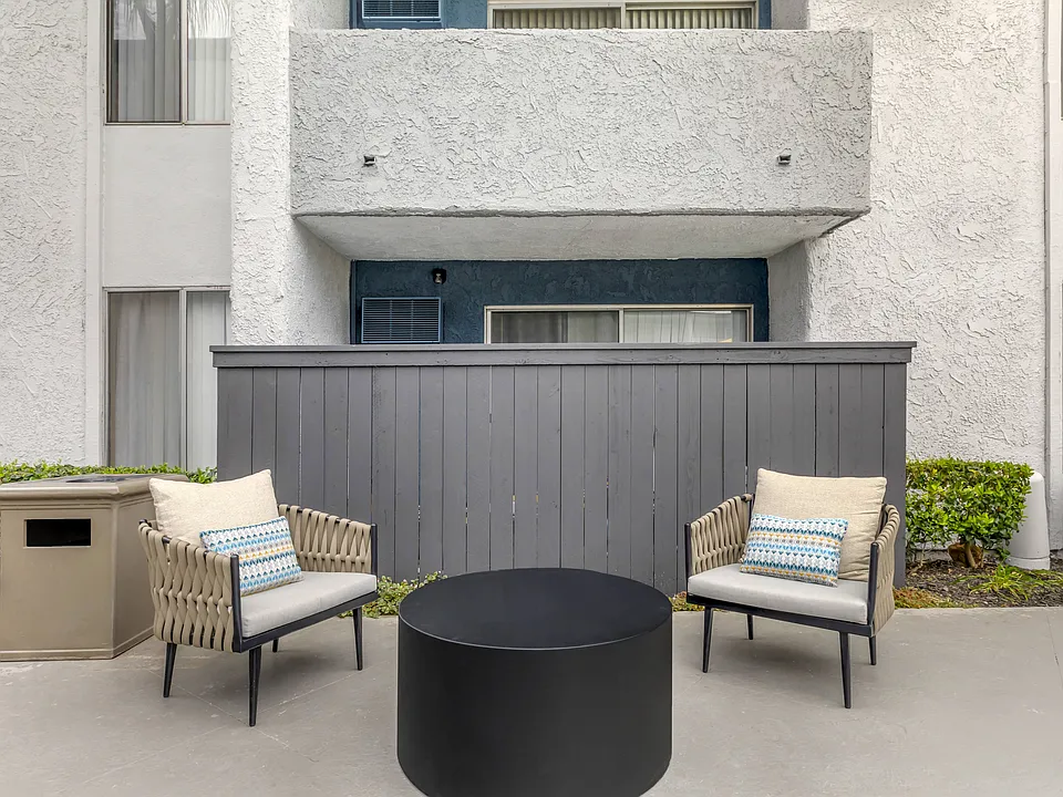 Relaxation awaits: Unwind poolside at Cornerstone Apartments with your own private patio oasis. Dive into serenity and soak up the sun in style.