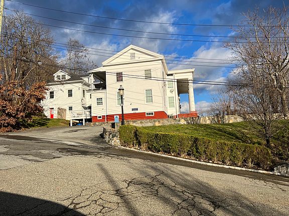 This unit is the top two floors on the extension to the left.