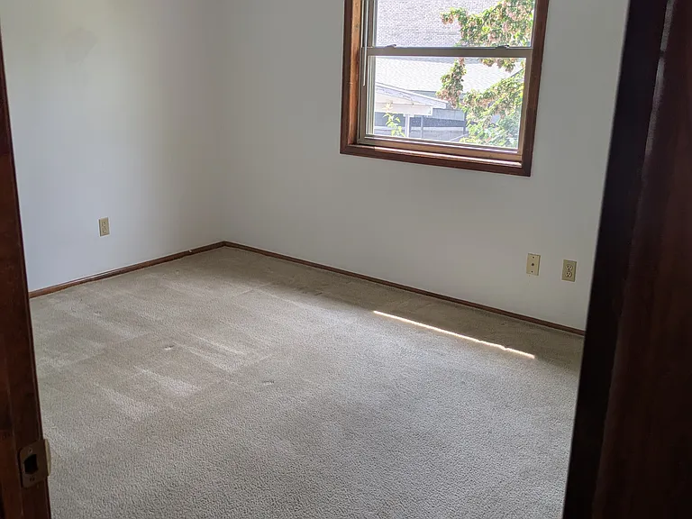 Bedroom 2, west facing windows.