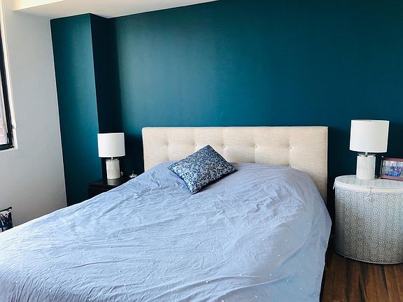 Bedroom with queen size bed and large closet
